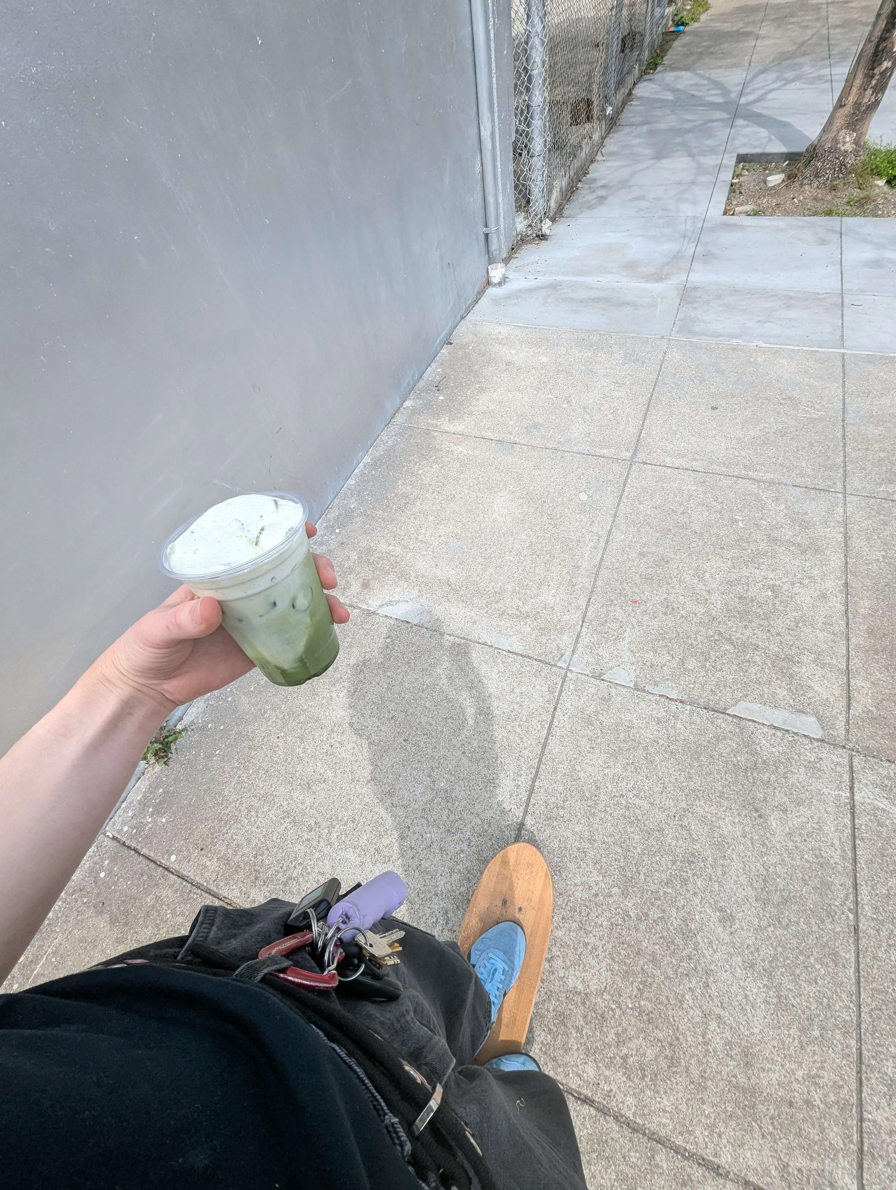 Gen skateboarding while holding kilavolt salted egg yolk matcha latte with cold foam